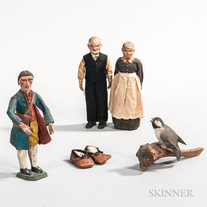 Three Carved Figures, a Pair of Miniature Shoes, and a Carved and Painted Chickadee on a Perch