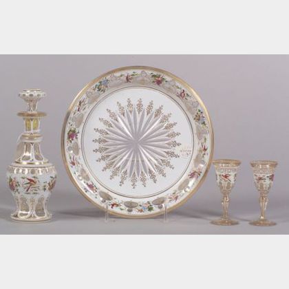 Four Piece Bohemian White Cased Cut-to-Clear Enamel Decorated Glass Cordial Set