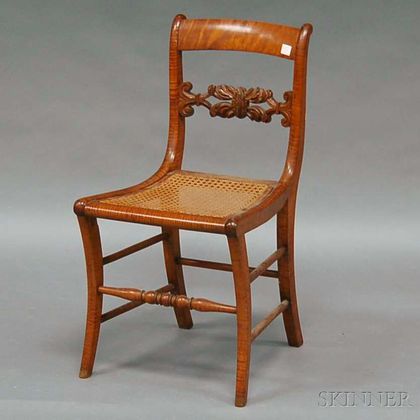 Classical Carved Tiger Maple Side Chair with Caned Seat. Estimate $100-150