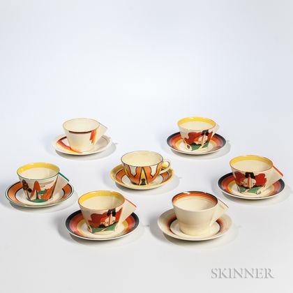 Seven Clarice Cliff Cups and Saucers