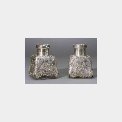Pair of Late Victorian Silver Mounted Colorless Glass Cologne Bottles