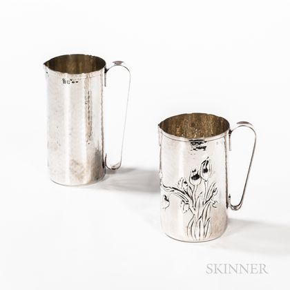 Two Hammered Silver Pitchers