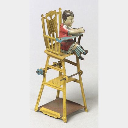 German Lithographed Tin Child in High Chair