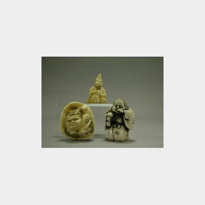 Three Japanese Carved Ivory Netsuke. 