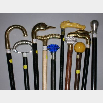 Collection of Ten Modern Ebonized Wood Canes and Walking Sticks