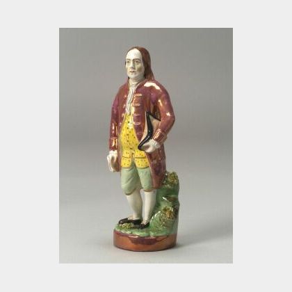 Polychrome Enamel and Pink Lustre Staffordshire Pottery Figure of Benjamin Franklin