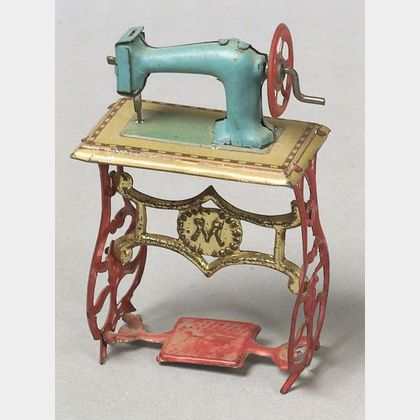 German Lithographed Tin Sewing Machine Penny Toy