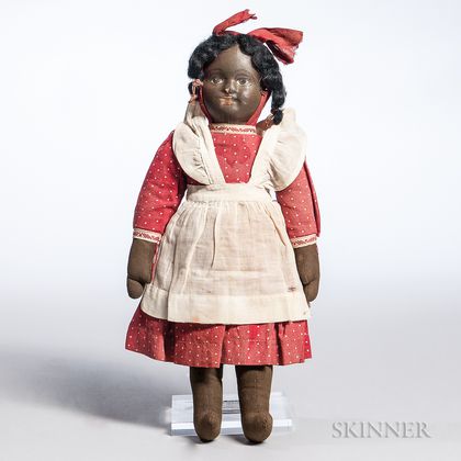 Black Oilcloth Girl Doll with Red Dress