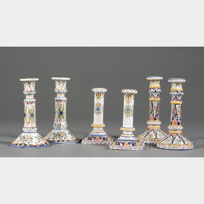 Three Pairs of French Faience Candlesticks