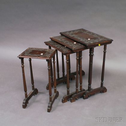 Set of Four Carved Walnut Nesting Tables