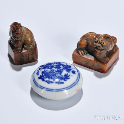 Two Carved Stone Seals and a Blue and White Porcelain Seal Paste Box