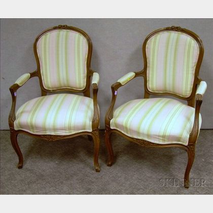 Pair of Louis XV Style Upholstered Carved Beechwood Fauteuils. 
