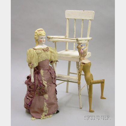 Two Dolls and Two Pieces of Play Furniture