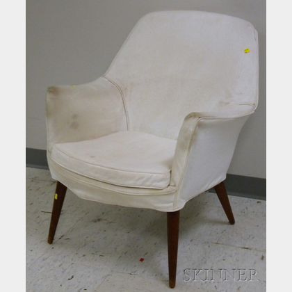 Mid-century Modern Upholstered Teak Armchair. Estimate $300-500