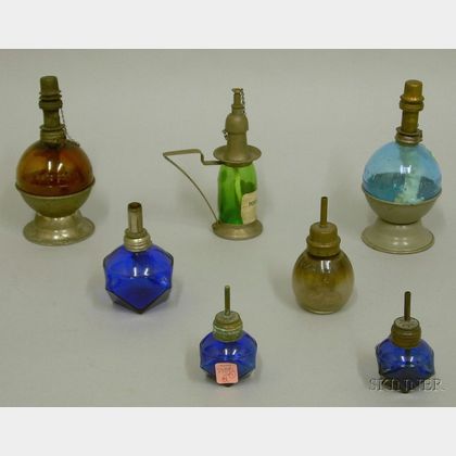 Seven Early Colored Glass and Metal Lighting Devices
