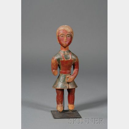 Carved and Painted Wooden Figure of a Schoolgirl