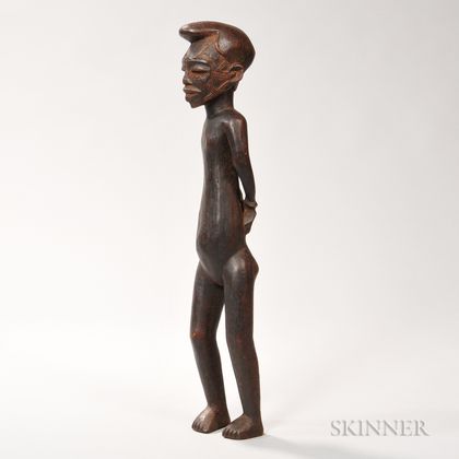 Carved African Figure with Shackles.