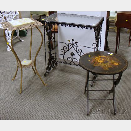 Victorian Onyx-top Brass Stand, a Black-painted Iron Table, and a Painted Floral Decorated Wooden Folding Stand. 