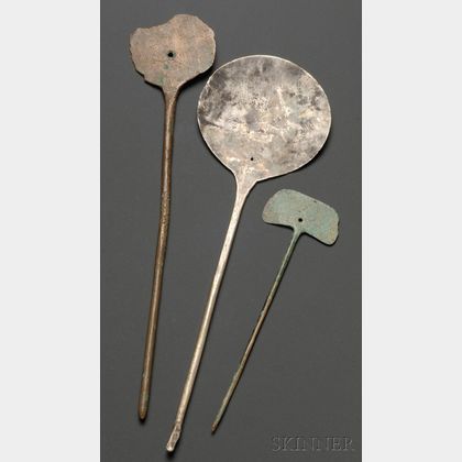Three Pre-Columbian Metal Optical Instruments
