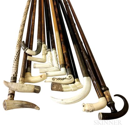 Thirteen Carved Bone, Tusk, and Wood Canes
