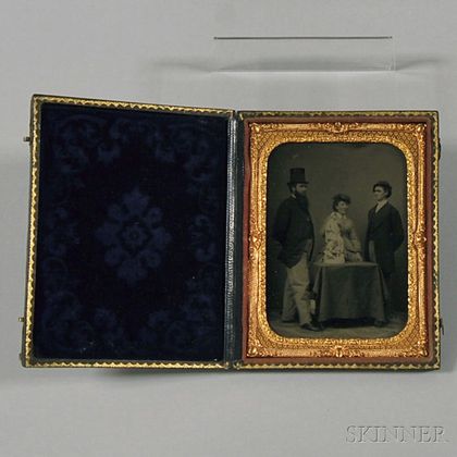 Quarter-plate Tintype Group of Three Figures with a Rogers Group Statue