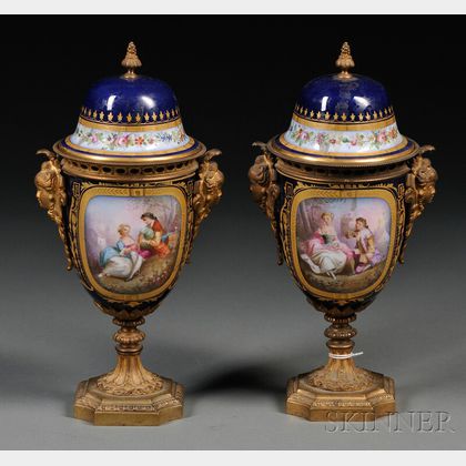 Pair of Bronze-mounted Sevres-style Cobalt Blue Porcelain Covered Urns