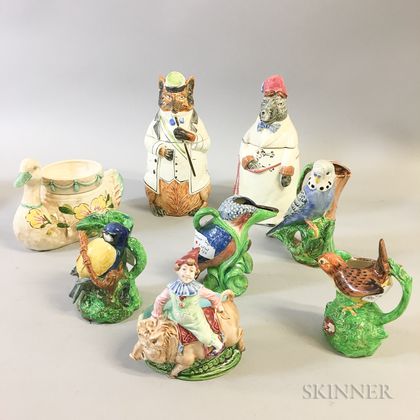 Eight Mostly English Glazed Ceramic Figural Vessels