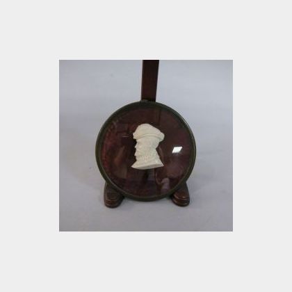 Framed Miniature Carved Ivory Profile of Henry VIII. together with several framed silhouettes. 