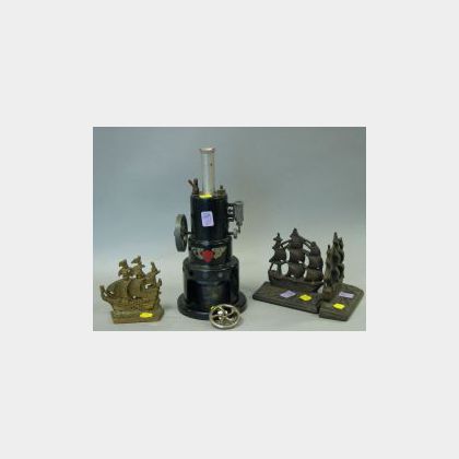 Pair of Cast Iron Old Ironsides Bookends, a Brass Sailing Ship Bookend and a Marv Painted Metal Robert Fulton Line Steam Engine Mod 