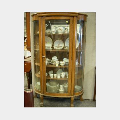 Late Victorian Carved Oak and Curved Glass China Cabinet. 