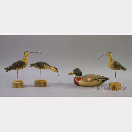 Carved and Painted Wooden Duck Decoy and a Set of Three Carved and Painted Wood Shorebird Figures