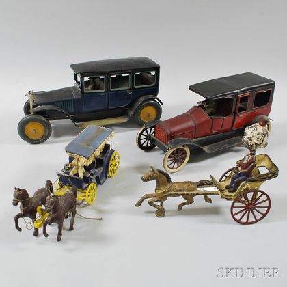 Four Toy Metal Vehicles