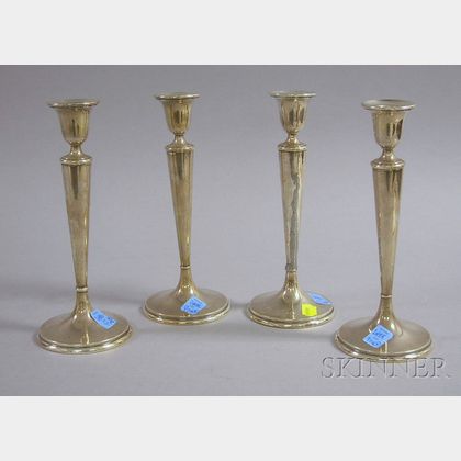 Set of Four Sterling Silver Richard Dimes Tall Weighted Candlesticks