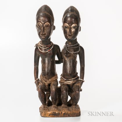 Baule-style Carved Wood Seated Male and Female Figures