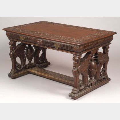 R.J. Horner & Co. Attributed Italian Renaissance-style Carved Mahogany Four-Drawer Library Table. 
