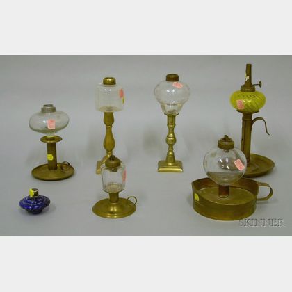 Seven Glass Peg Lamps on Brass Candlestick Bases