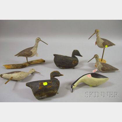 Two Small Primitive Black-painted Carved Wooden Duck Decoys and Five Carved and Painted Wooden Shorebird Decoys
