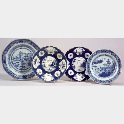 Four Blue and White Pottery Plates
