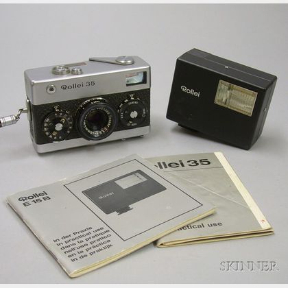 Rollei 35 No. 3004299, Germany, chrome, with a Carl Zeiss Tessar f/3.5 40mm lens no. 4321269, in makers case; Rollei flash; and manuls 