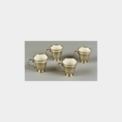 Set of Twelve Porcelain and Sterling Framed Demitasse Cups and Saucers