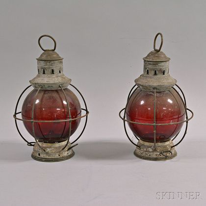 Two Tin and Red Glass Lanterns