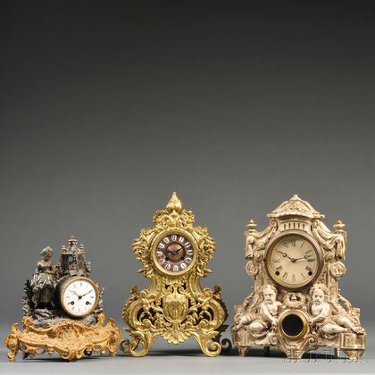 Three Metal Cased Clocks