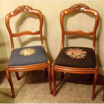 Two Victorian Rococo Revival Needlepoint Upholstered Carved Walnut Parlor Side Chairs. 