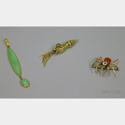 Gold and Jade Pendant, a Costume Spider Brooch, and a Fish-form Pendant. 