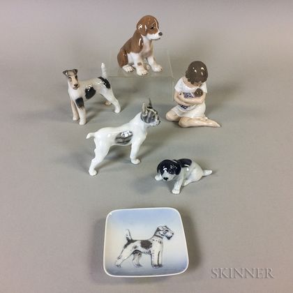 Four Royal Copenhagen Porcelain Dogs, a Mother and Child, and a Dog Dish
