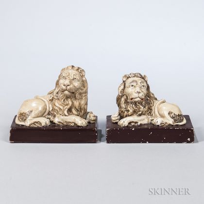 Pair of Wood & Caldwell Earthenware Lions