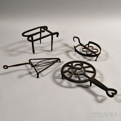 Four Mostly Wrought Iron Trivets