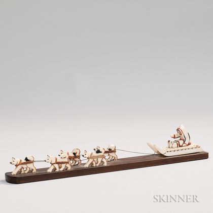 Carved and Painted Whale Ivory Sled Dog Team and Sled