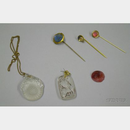 Two Molded Glass Pendants, Three Molded Glass Face Stickpins, and a Loose Glass Face Plaque. 