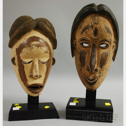Two Punu Carved Wooden Masks